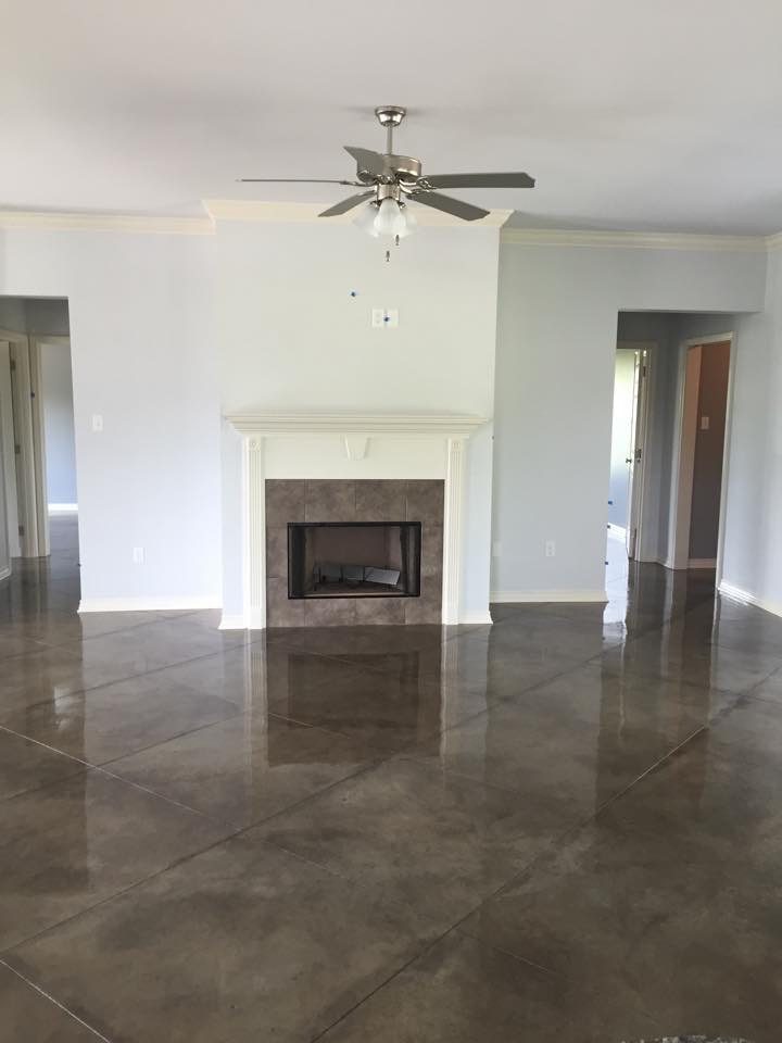 Patina custom-stained great room floor with sawcut pattern — Brentwood